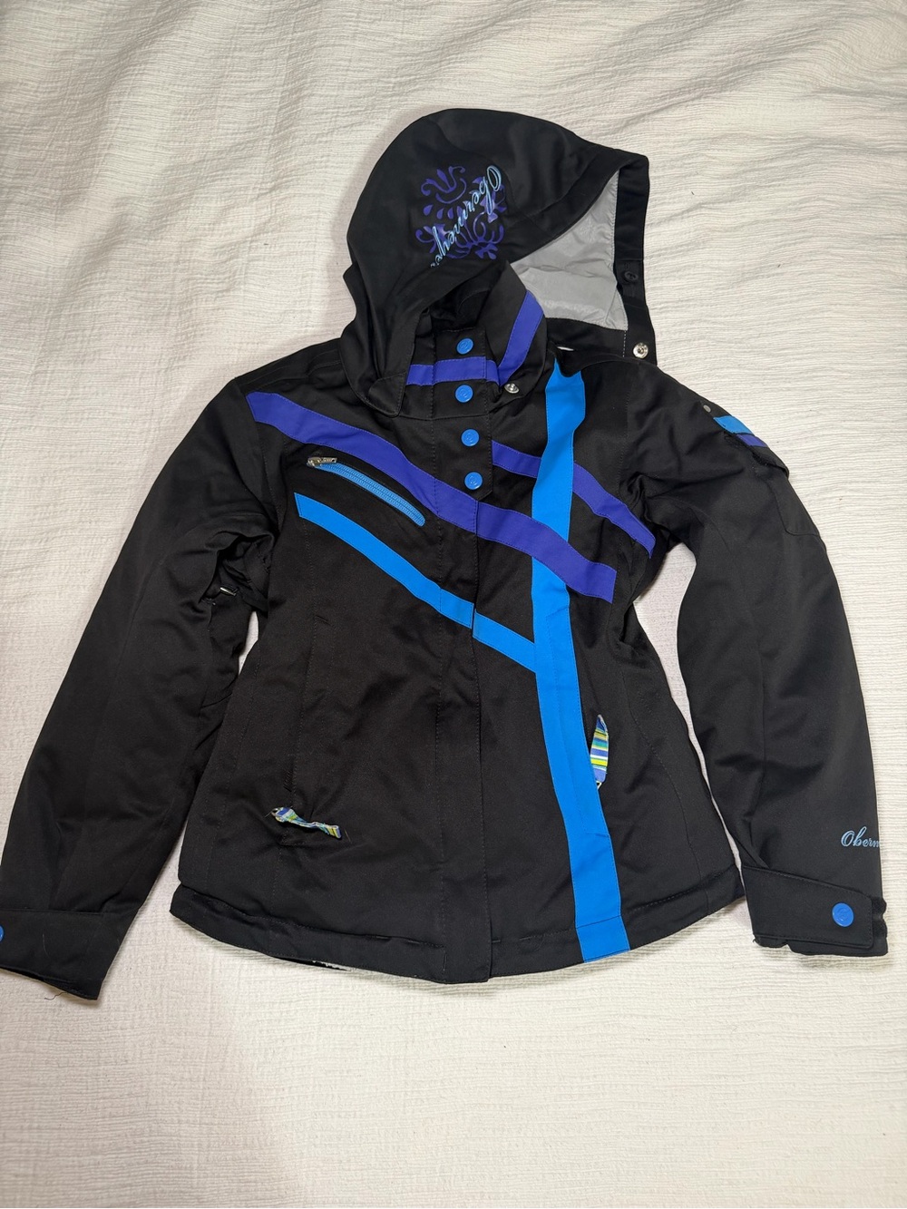 Obermeyer Black Ski Jacket with Blue and Purple Stripes